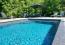 piscine 8x4 dans un espace arboré et sa terrasse de 70 m² et terrain arboré, Photo 1